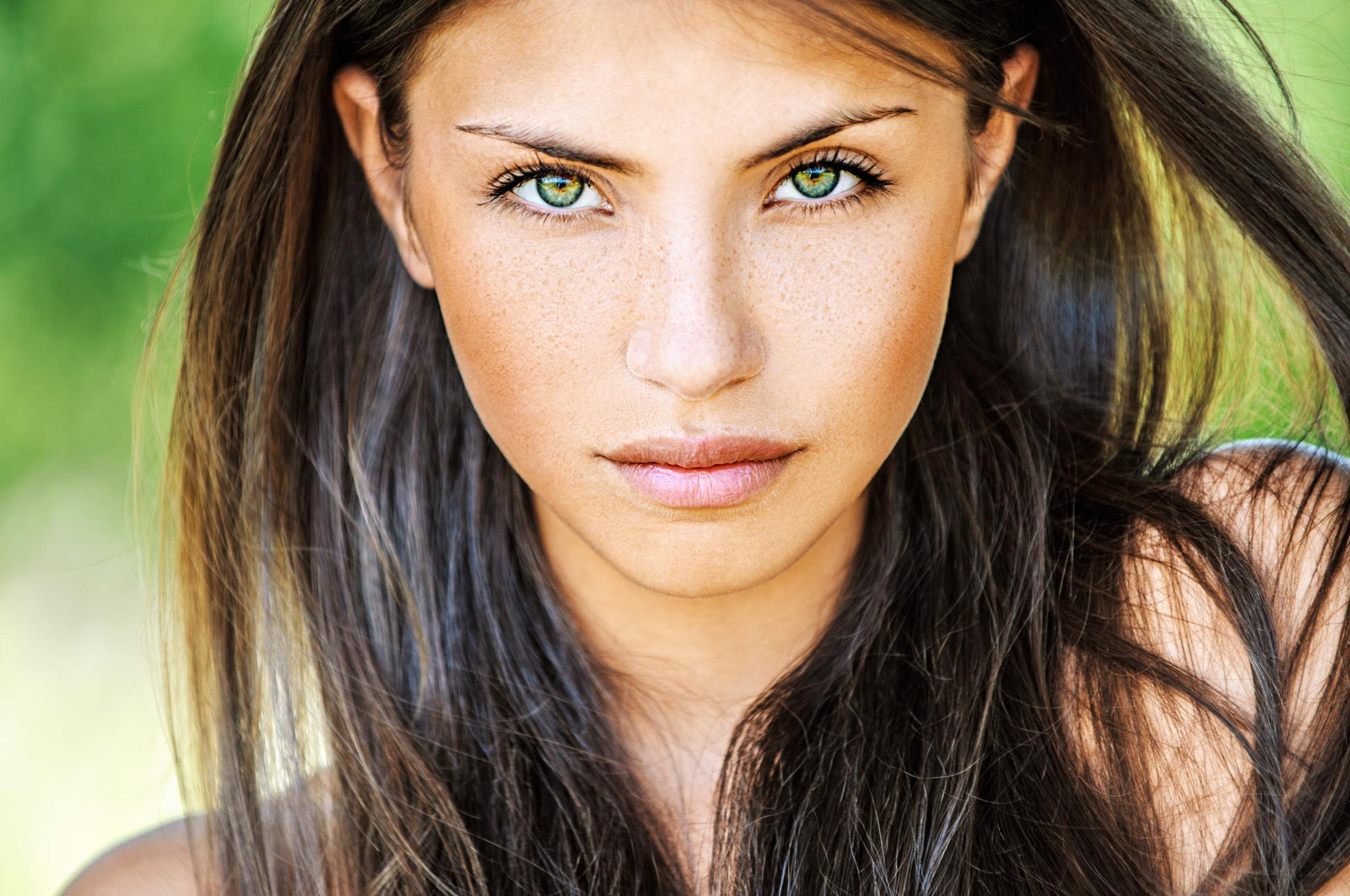 young beautiful woman with beauty green eyes and lips