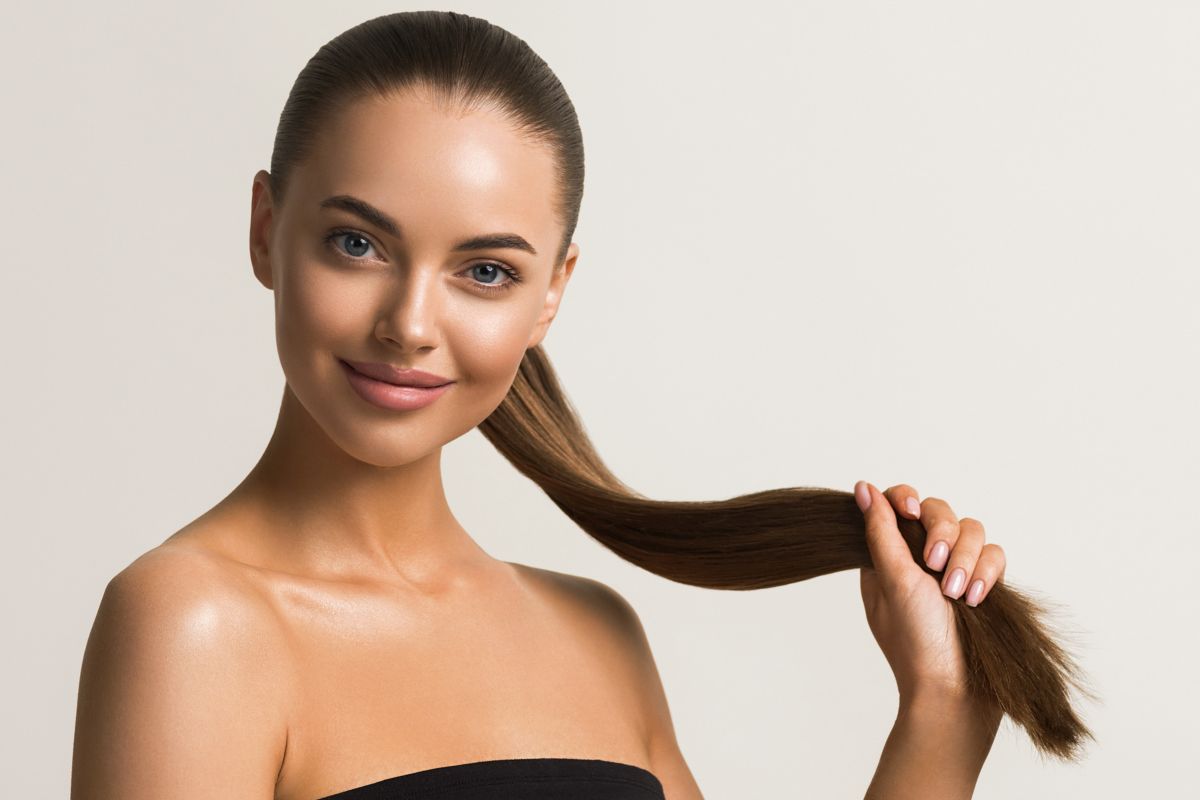 beautiful woman with glowing tanned skin